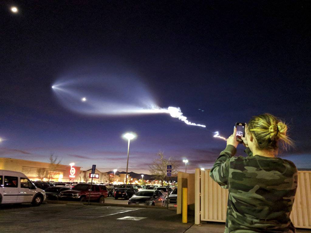 Rocket lights sky as it carries satellites from Vandenberg AFB