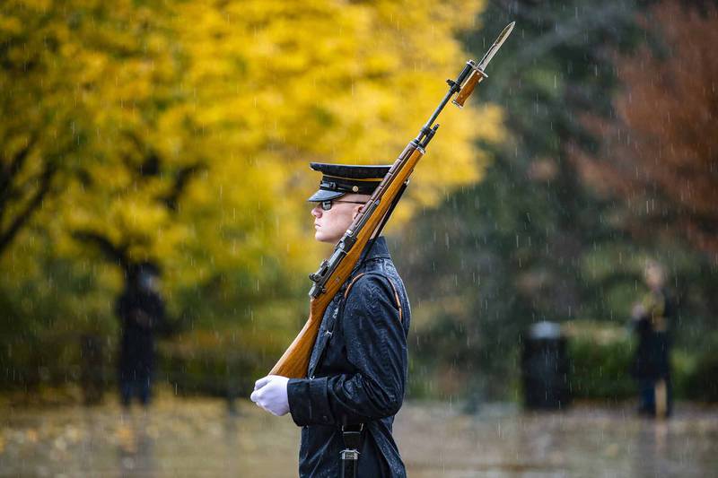 A sentinel from the Old Guard walks the mat at the Tomb of the Unknown Soldier at Arlington National Cemetery, Arlington, Va., Nov. 11, 2020.