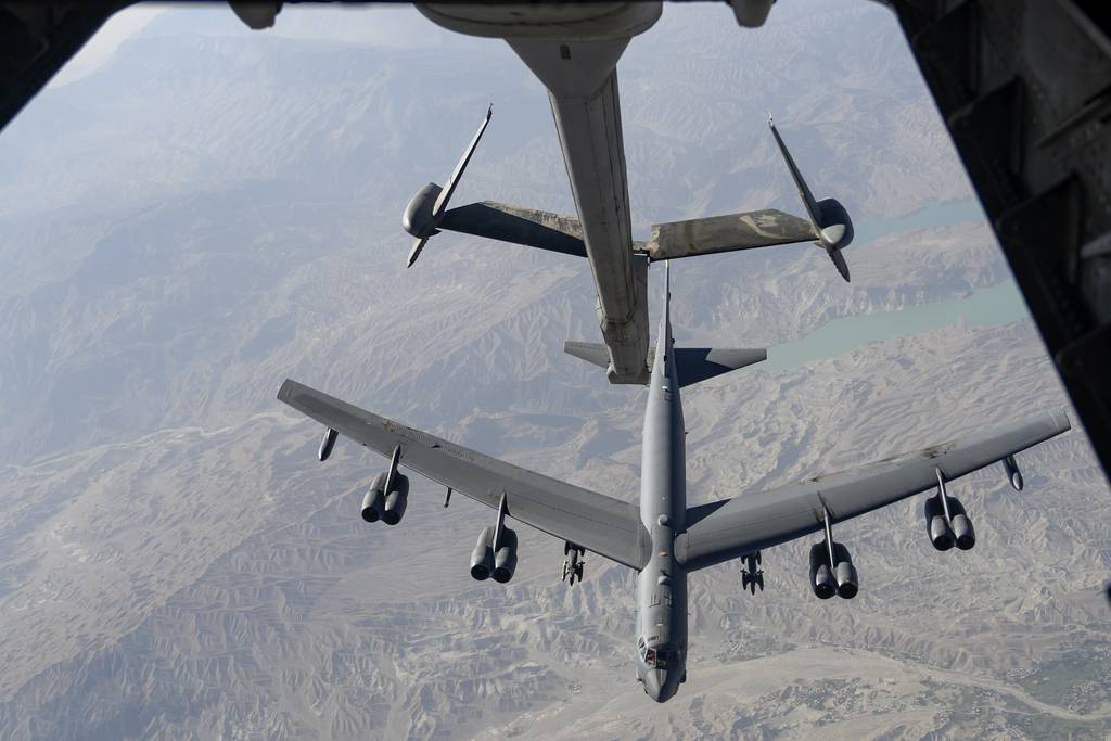 A U.S. Air Force B-52H Stratofortress aircraft approaches a KC-10 Extender aircraft over an undisclosed location in Southwest Asia to receive fuel during a mission on Aug. 13, 2021. (Tech. Sgt. Michelle Y. Alvarez/Air Force)
