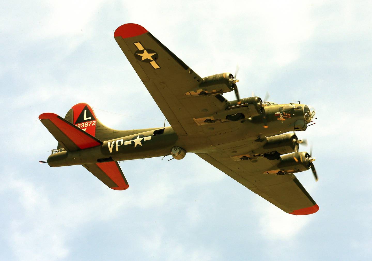 The historic military B-17 aircraft named "Texas Raiders" flies over Barksdale A.F.B., La., on May 8, 2021.