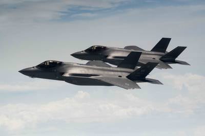 U.S. Air Force and South Korean air force F-35A Lightning II aircraft soar in a tight formation over Korea, July 12, 2022. The 356th Fighter Squadron from Eielson Air Force Base, Alaska, arrived in South Korea to conduct combined training flights with the Republic of Korea's 151st and 152nd fighter squadrons. (Senior Airman Trevor Gordnier/Air Force)