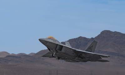 An F-22 Raptor takes off during Black Flag 22-1 at Nellis Air Force Base, Nevada. Black Flag 22-1 investigates electronic warfare techniques and future programming.