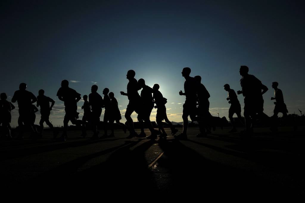 Members of the 8th Fighter Wing participate in the Warrior Run July 19, 2011, at Kunsan Air Base, South Korea.