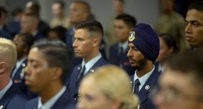 Airman 1st Class Sunjit Rathour was the first Sikh airman to receive a religious accommodation, and may grow his beard and wear his turban while in uniform. A policy-focused team within the Air Force is considering the merits of a pilot program to study beard wear. (Alexander Goad/Air Force)