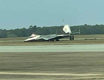 An unverified picture posted to Facebook on March 22, 2022, appears to show an F-22 Raptor fighter jet nose-down in the grass next to a runway at Eglin Air Force Base, Florida, that morning.
