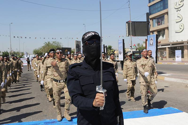 Iraqi Popular Mobilization Forces march in Baghdad, Iraq.