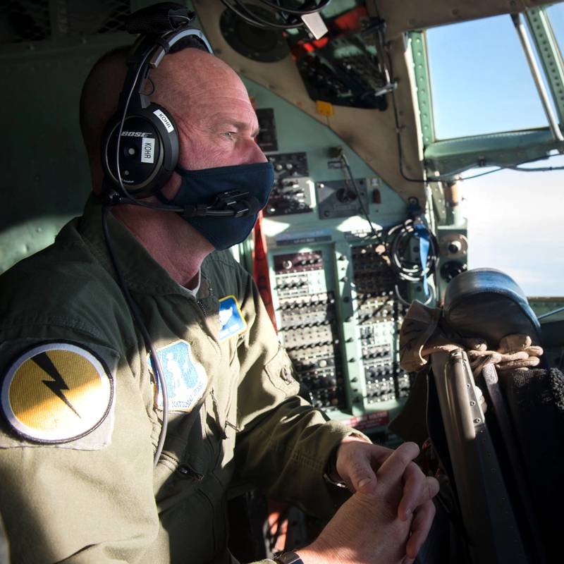The then Chief Staff Sgt.  Jamie Kohr, a flight engineer assigned to the 103rd Operations Group, works aboard a C-130H aircraft en route to Washington, DC, Jan. 15, 2021, East Granby, Connecticut.  Guardsmen were mobilized to support security operations in the days leading up to the United States presidential inauguration.  (Tech. Sgt. Tamara R. Dabney/Air National Guard)