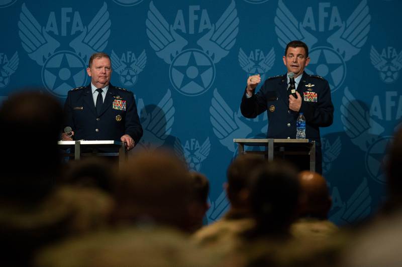 Air National Guard chief Lt. Gen. Michael Loh (right) and Air Force Reserve chief Lt. Gen. Richard Scobee talk about Total Force Integration at the annual Air Force Association in National Harbor, Maryland.  , September 21, 2021. Photo via @GenCQBrownJr on Twitter.