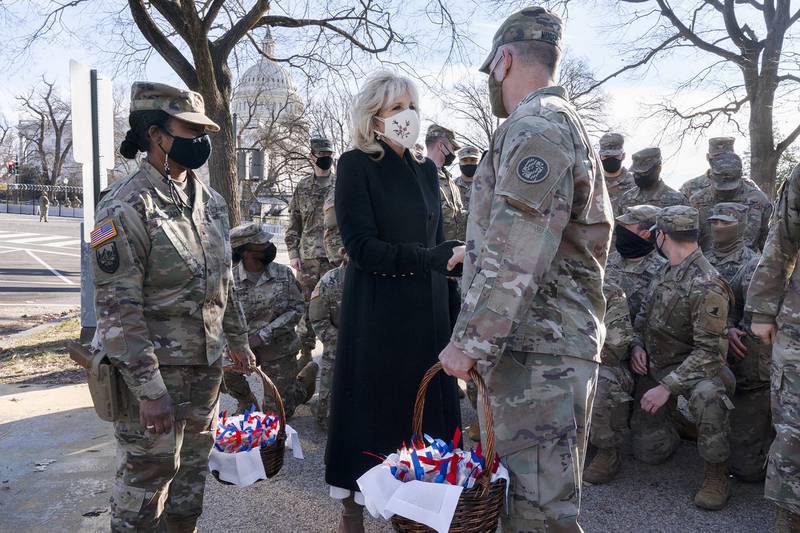 Saying, "The Biden's are a National Guard family," first lady Jill Biden greets members of the National Guard with chocolate chip cookies Jan. 22, 2021, at the U.S. Capitol in Washington.