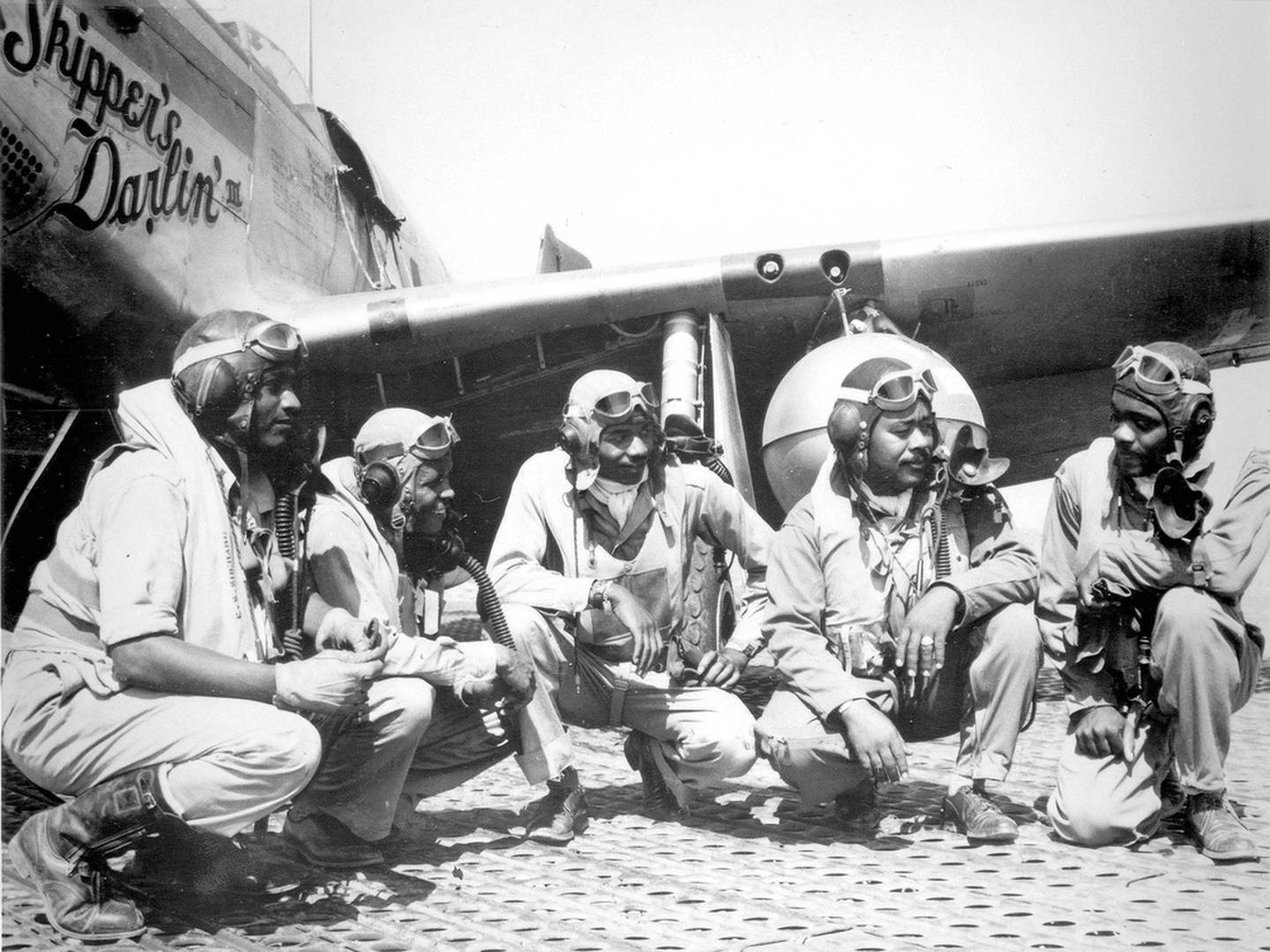 (From left) Lt. Dempsey W. Morgan, Lt. Carrol S. Woods, Lt. Robert H. Nelson Jr., Capt. Andrew D. Turner and Lt. Clarence D. Lester, shown in Ramitelli, Italy, were pilots with the 332nd Fighter Group. The airmen with the elite, all-black fighter group were better known as Tuskegee Airmen. (U.S. Air Force photo)