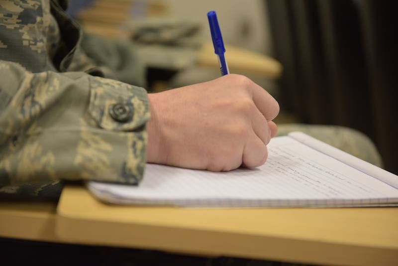 Staff Sgt. Matthew Shannon, from the 911th Force Support Squadron Individual Personnel Preparedness Office, takes notes during a seminar on writing bullet points for performance reports at Pittsburgh International Airport Air Reserve Station, April 8, 2018. The EPR bullet point seminar was conducted by the Chief Master Sergeant Chin Cox, the Office of the Joint Staff Surgeon Senior Enlisted Leader at the Pentagon, to improve the Airmen's writing skills.  (Airman 1st Class Grace Thomson/Air Force)