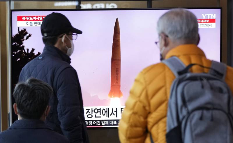A TV screen shows a file image of North Korea's missile launch during a news program at the Seoul Railway Station in Seoul, South Korea, Thursday, March 16, 2023.