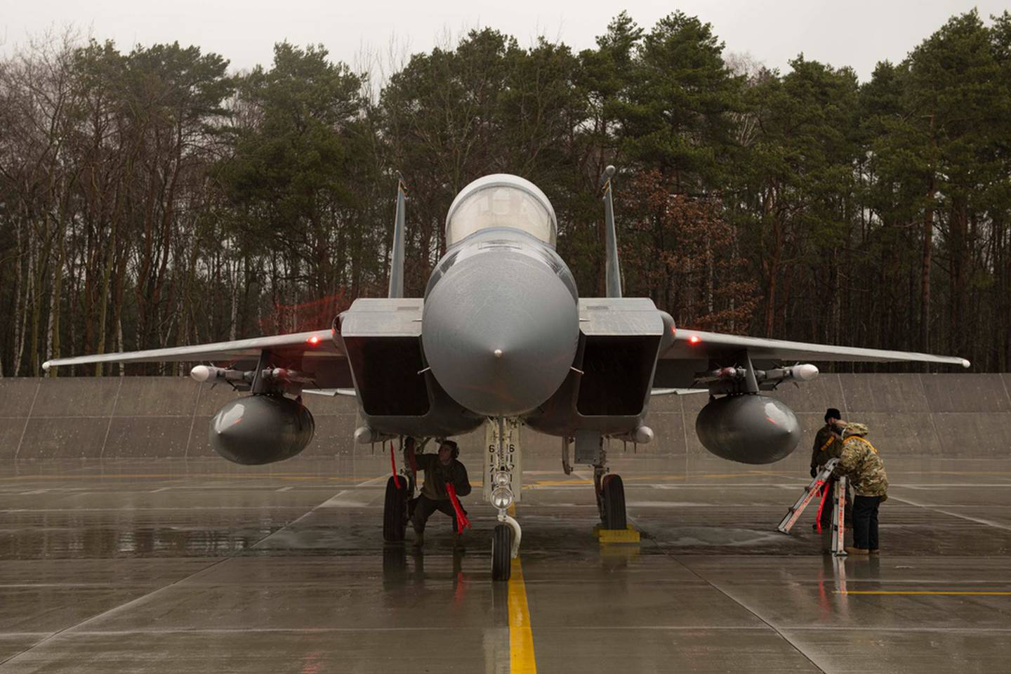 An F-15C Eagle assigned to the 493rd Fighter Squadron sits ready to perform NATO enhanced Air Policing at Łask Air Base, Poland, Feb. 11, 2022. During enhanced air policing, jets and aircrew are ready to respond to any airborne threat at a moment’s notice, ensuring the mutual protection of the U.S. and allied interests. (Tech. Sgt. Jacob Albers/Air Force)