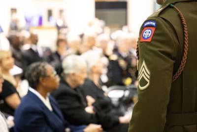 A soldier from the 82nd Airborne Division All-American Chorus stands at attention during a ceremony at the Airborne and Special Operations Museum, Fayetteville, N.C., Sept. 9, 2023.