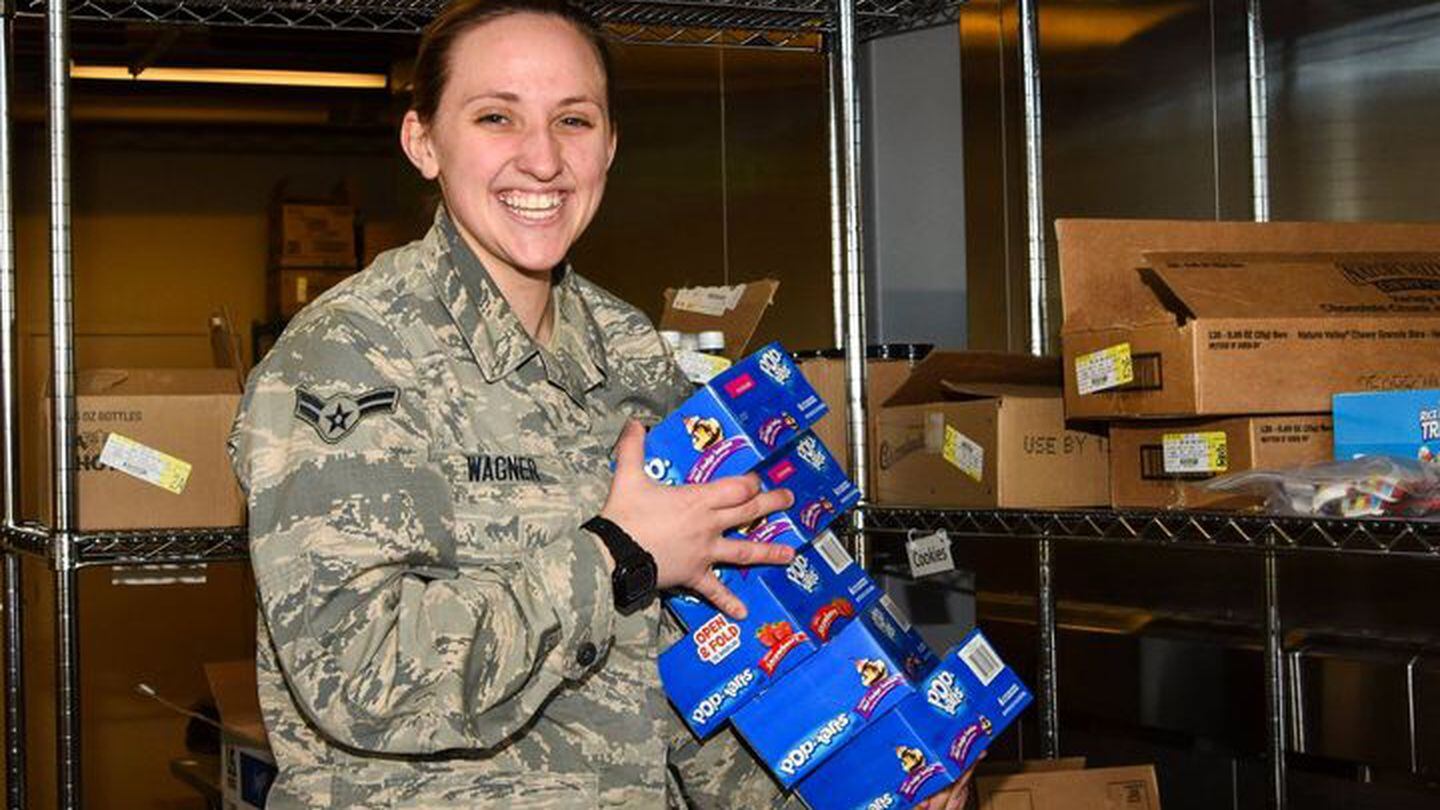 An airman unloads boxes of Pop-Tarts, one of the most sought-after snacks among service members, at home or abroad. (Minot AFB/Facebook)