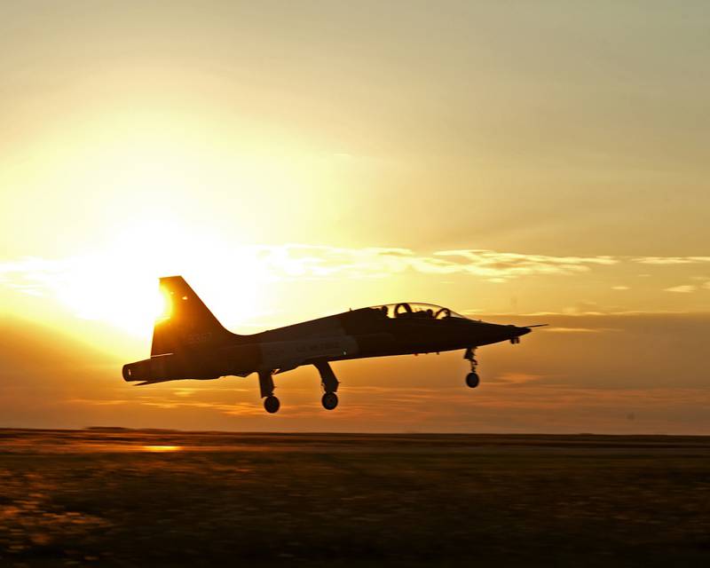 Pilots from the 80th Flying Training Wing Euro-NATO Joint Jet Pilot Training program fly into the sunrise Oct. 2, 2014, at Sheppard Air Force Base, Texas. (Danny Webb/Air Force)