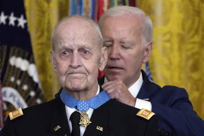 President Joe Biden awards the Medal of Honor to Capt. Larry Taylor, an Army pilot from the Vietnam War who risked his life to rescue a reconnaissance team that was about to be overrun by the enemy, during a ceremony Tuesday, Sept. 5, 2023, in the East Room of the White House in Washington.