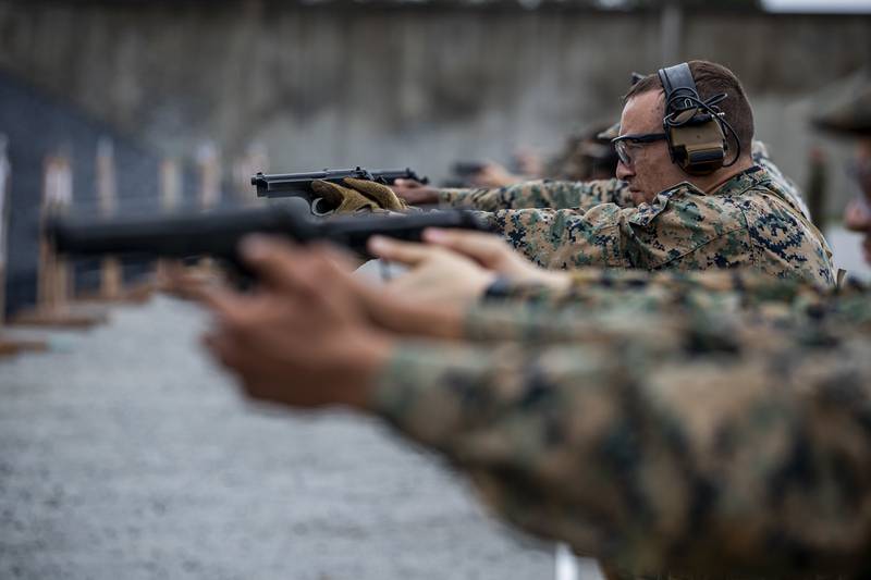 Gunnery Sgt. Nathaniel Schoenhoefer takes aim during the 2020 Far East Intramural Matches on Camp Hansen, Okinawa, Japan, Dec. 10, 2020.