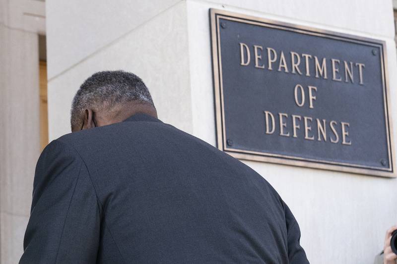 Defense Secretary Lloyd Austin arrives at the Pentagon on Jan. 22, 2021, in Washington.