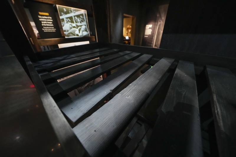 A recreation of bunks in a concentration camp is part of the new pavilion of the National World War II Museum, in New Orleans, Tuesday, Oct. 31, 2023.