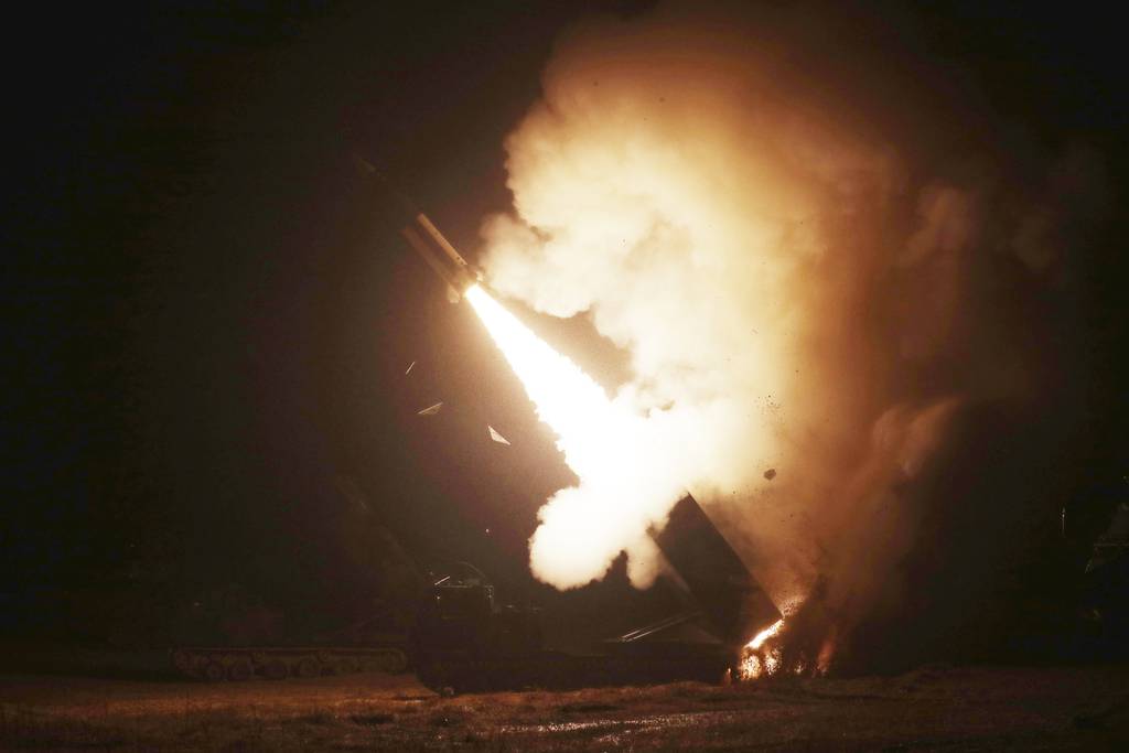 In this photo provided by South Korea Defense Ministry, an Army Tactical Missile System or ATACMS, missile is fired during a joint military drill between U.S. and South Korea at an undisclosed location in South Korea, Wednesday, Oct. 5, 2022.