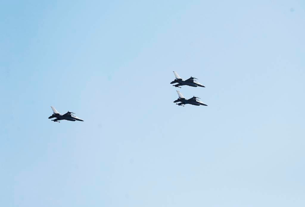 In honor of Ross Perot's commitment to the military and veterans, F-16 fighter jets fly during his gravesite service in a missing man formation over Sparkman-Hillcrest Memorial Park Cemetery in Dallas on Tuesday, July 16, 2019.