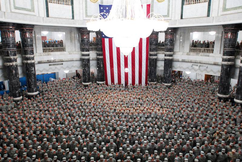 1,215 U.S. service members from all over Iraq re-enlisted during a ceremony in the Al Faw Palace rotunda at Camp Victory in Baghdad, July 4, 2008.