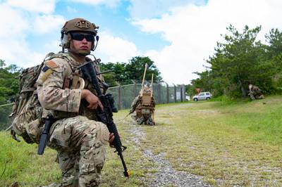 Senior Airman Miguel Ramirez, an Explosive Ordnance Disposal technician from the 18th Civil Engineer Squadron, provides security while on patrol during an Improvised Explosive Device training event on Kadena Air Base, Japan, May 26, 2021. (Airman 1st Class Yosselin Perla/Air Force)
