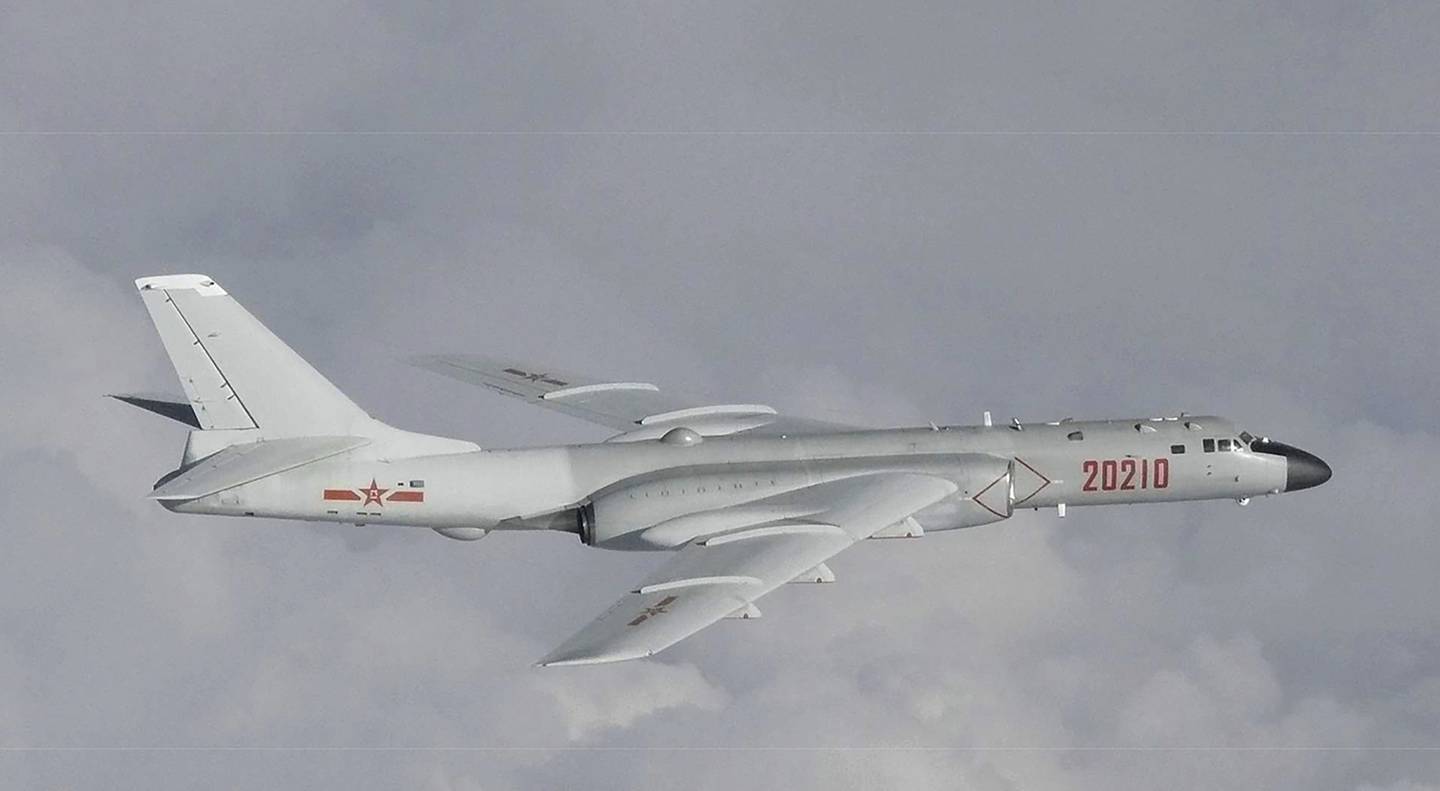 This image released by Joint Staff, Ministry of Defense, shows a Chinese H-6 bomber which they said were flying near the Sea of Japan Tuesday, July 23, 2019.