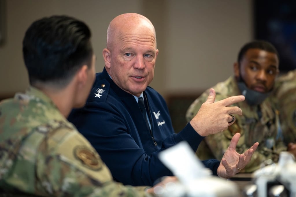 U.S. Space Force Chief of Space Operations Gen. W. John “Jay” Raymond speaks with a guardian during a breakfast engagement, Oct. 12, 2021, at Schriever Space Force Base, Colorado. (Dennis Rogers/Space Force)