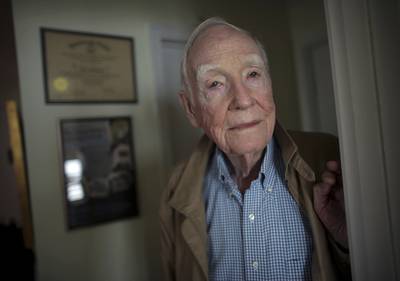 Veteran John Waller, who served in Europe during WWII, poses at his home, Thursday, Sept. 24, 2020, Virginia Beach, Va.