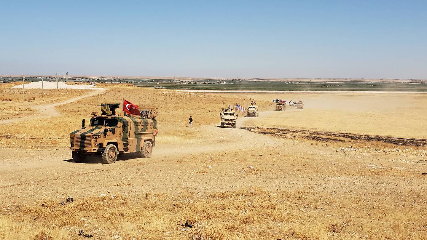U.S. and Turkish military forces conduct a joint ground patrol Sept. 8, 2019, inside the safe zone established in northeast Syria.
