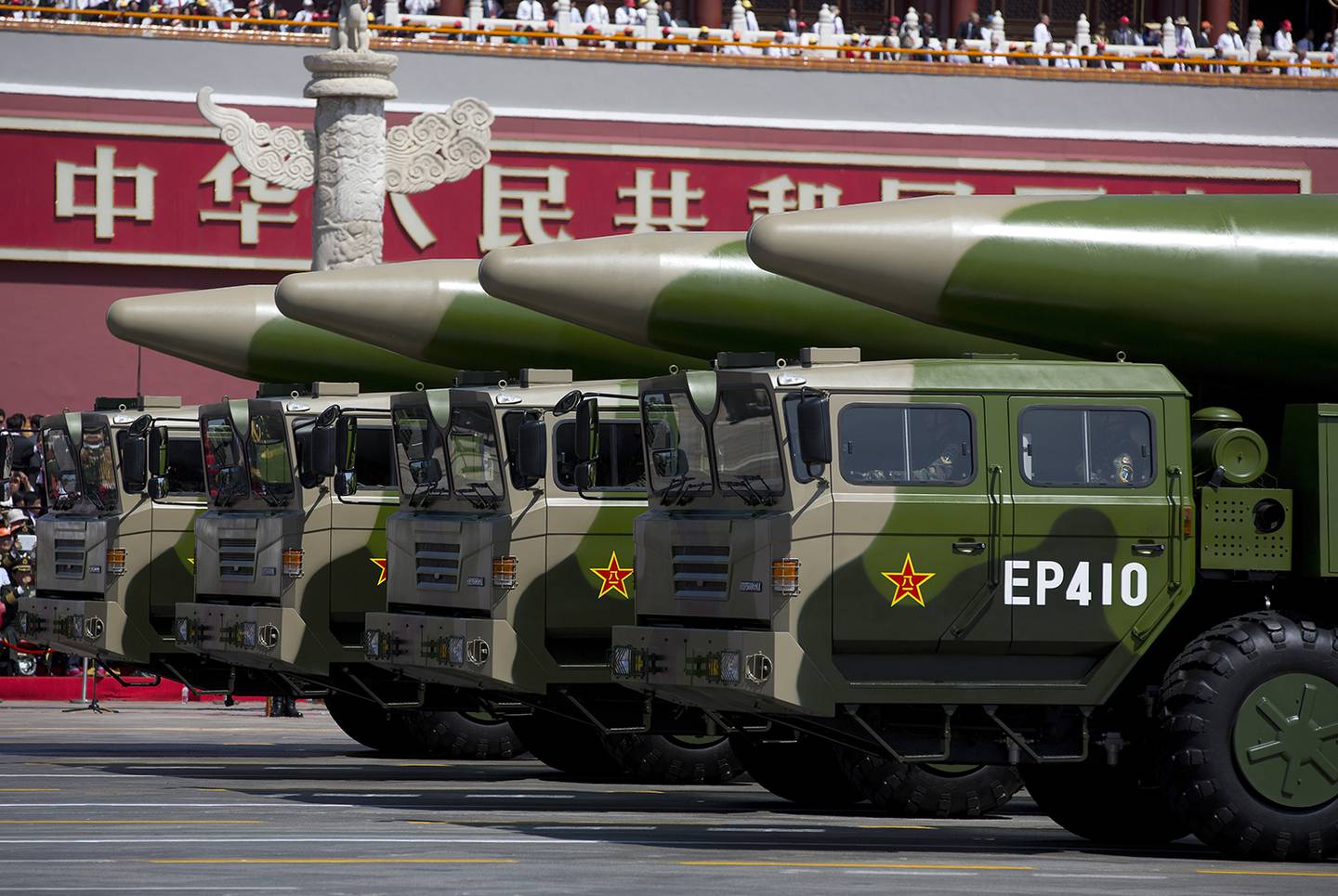 Military vehicles carrying DF-26 ballistic missiles, drive past the Tiananmen Gate during a military parade to mark the 70th anniversary of the end of World War II on Sept. 3, 2015, in Beijing.