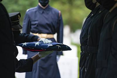 Soldiers assigned to 1st Battalion, 3d U.S. Infantry Regiment (The Old Guard) conduct modified military funeral honors for an Army Air Forces airman in Section 1 of Arlington National Cemetery, Arlington, Virginia, June 11, 2020.