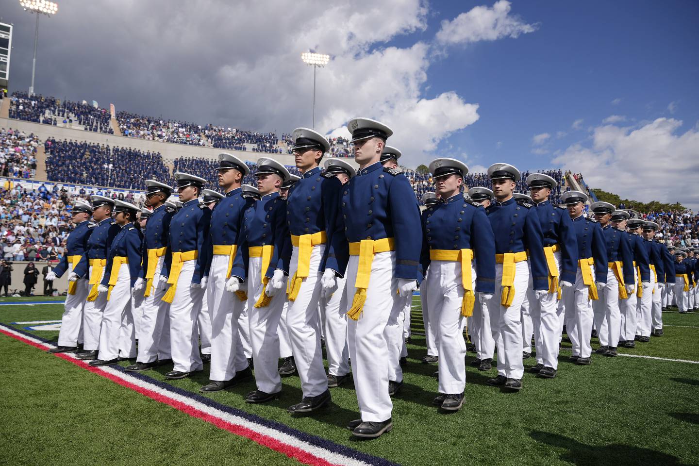 Cadets walk into position during the 2023 Air Force Academy Graduation Ceremony at Falcon Stadium, Thursday, June 1, 2023, at the United States Air Force Academy in Colorado Springs, Colo.
