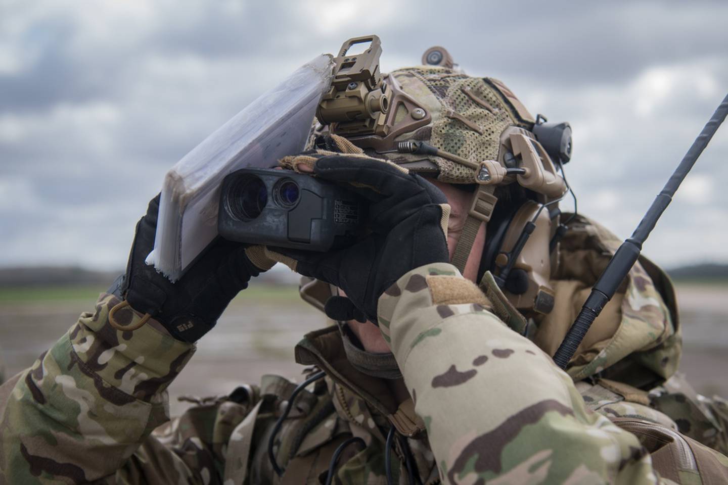 A special tactics operator stationed at the 352nd Special Operations Wing at RAF Mildenhall uses a scope to look at a target while training for close air support during exercise Valiant Liberty at RAF Sculthorpe Training Range, U.K., March 9, 2020. (Staff Sgt. Rose Gudex/Air Force)