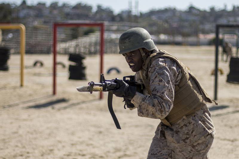 A recruit with Echo Company, 2nd Recruit Training Battalion participates in the Bayonet Assault course at Marine Corps Recruit Depot, San Diego, May 20, 2020.