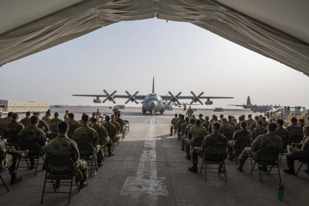 Members of the 380th Air Expeditionary Wing take part in the inactivation ceremony of the 41st Expeditionary Electronic Combat Squadron at Al Dhafra Air Base, United Arab Emirates, Sept. 28, 2021. The 41st EECS operated the EC-130H Compass Call aircraft, conducting electronic warfare for just under 20 years in the U.S. Central Command area of responsibility before being officially inactivated. (Master Sgt. Wolfram Stumpf/Air Force)