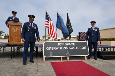 Space Force Col. Matthew Holston, Space Delta 8 commander, left, and Lt. Col. Jason Sanders, 10th Space Operations Squadron commander, right, reveal the 10 SOPS sign for the first time at the 10 SOPS activation ceremony at Point Mugu, California, June 6, 2022. 10 SOPS will fall under Space Operations Command’s satellite communications organization, Delta 8, and perform the mission formerly fulfilled by the Naval Satellite Operations Center, which shut down the same day. (SrA Daniel Sanchez/Space Force)