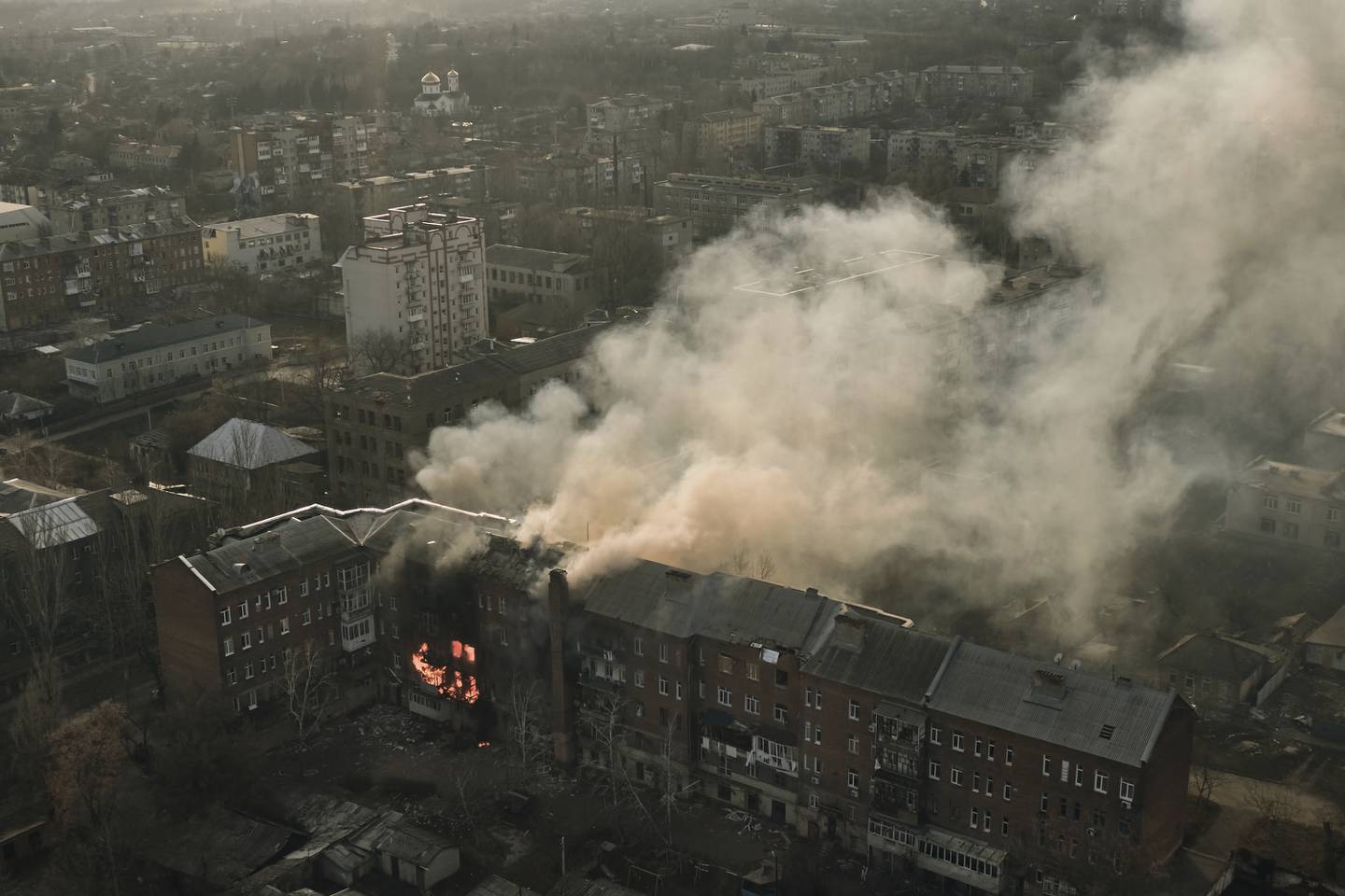 An apartment burns after Russian shelling in Bakhmut, Donetsk region, Ukraine, Wednesday, Dec. 7, 2022.