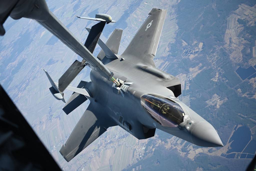 A U.S. Air Force F-35A Lightning II aircraft assigned to the 34th Fighter Squadron receives fuel from a KC-10 Extender aircraft over Poland, Feb. 24, 2022. The F-35A aircraft affords NATO leaders the flexibility to project power and assert air dominance in highly contested environments. (Senior Airman Joseph Barron/Air Force)