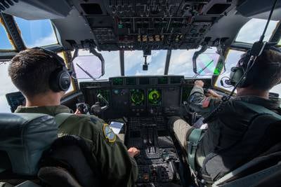 Lt. Col. Dave Gentile, 53rd Weather Reconnaissance Squadron aircraft commander, and Maj. Alex Boykin, 53rd WRS pilot, steer a WC-130J Super Hercules aircraft inside the eye of Hurricane Ian Sept. 27, 2022.