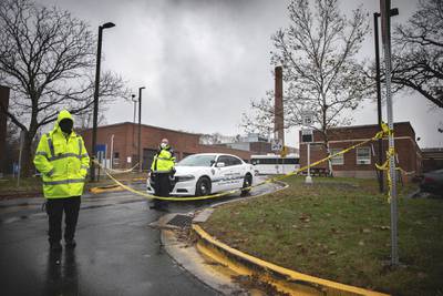 Veterans Affairs Police guard the entrance to a maintenance facility after an apparent steam explosion in a maintenance building at a Veterans Affairs hospital in West Haven, Conn., Friday, Nov. 13, 2020.