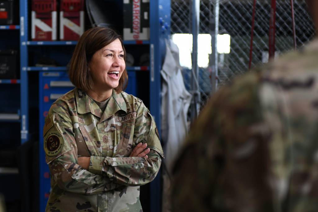 Chief Master Sergeant of the Air Force JoAnne S. Bass listens to airmen in Lincoln, Neb., July 19, 2021. During her visit, Chief Bass listened to the concerns of airmen and talked about upcoming changes to Air Force policies. (Staff Sgt. Jessica Montano/Air Force)