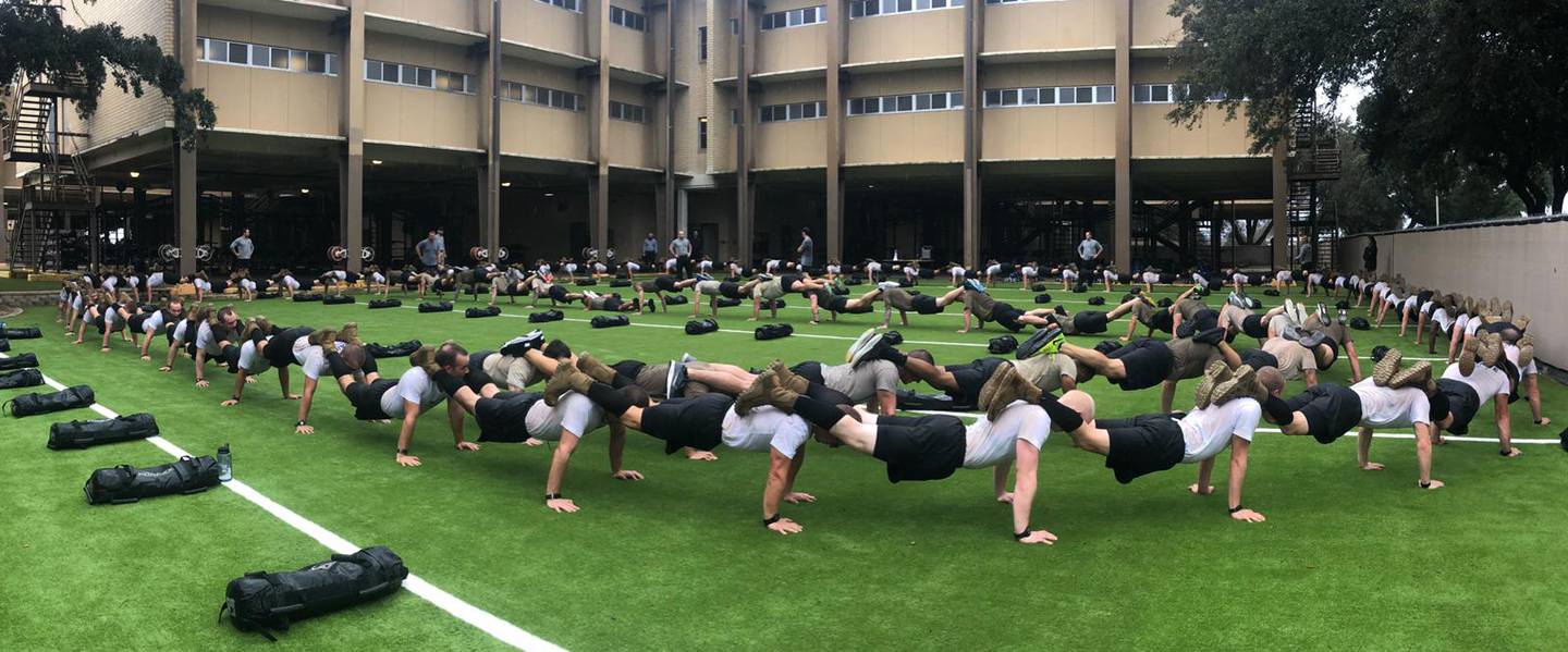 Special warfare airmen-in-training conduct team pushups at Joint Base San Antonio-Lackland, Texas, in an undated photo. (Special Warfare Training Wing/Air Force)
