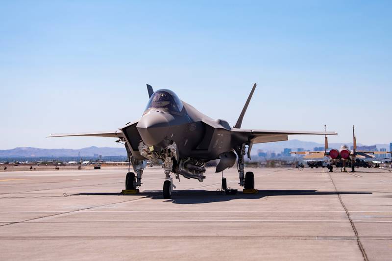 An F-35A Lightning II carrying a B61-12 Joint Test Assembly sits on the flight line at Nellis Air Force Base, Nevada, Sept. 21, 2021. Two F-35A Lightning II aircraft released B61-12 Joint Test Assemblies during the first full weapon system demonstration, completing the final flight test exercise of the nuclear design certification process. (Airman 1st Class Zachary Rufus/Air Force)
