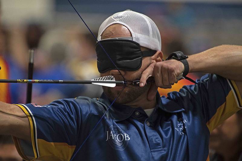 Coast Guard Maritime Enforcement Specialist 2nd Class Jacob Cox competes for Team Navy in archery at the 2019 Department of Defense Warrior Games on June 24 in Tampa, Fla.