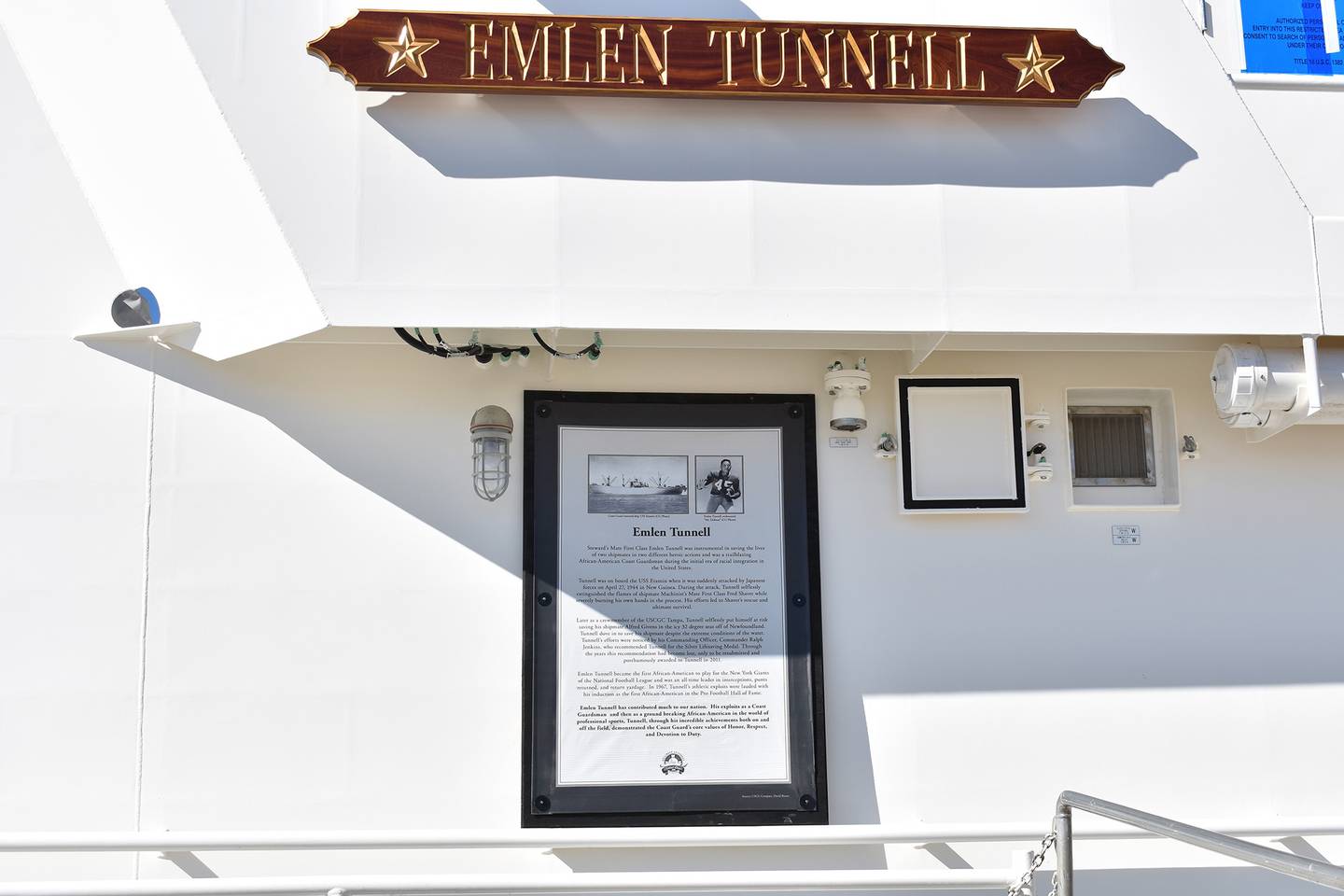 This undated photo provided by the United States Coast Guard shows a name plate and tribute plaque for Emlen Tunnell on a U.S. Coast Guard cutter docked in Bollinger Shipyard, Lockport, La.