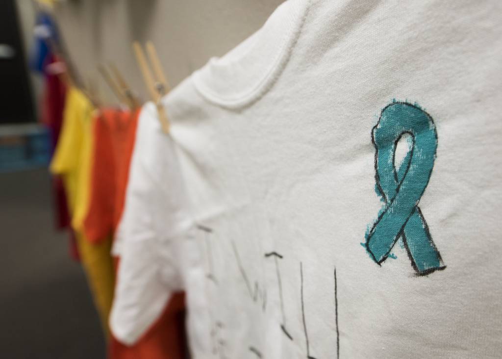 Clothes hang on a clothesline in honor of sexual assault victims in the Sexual Assault Prevention and Response office at Minot Air Force Base, North Dakota, April 10, 2018.